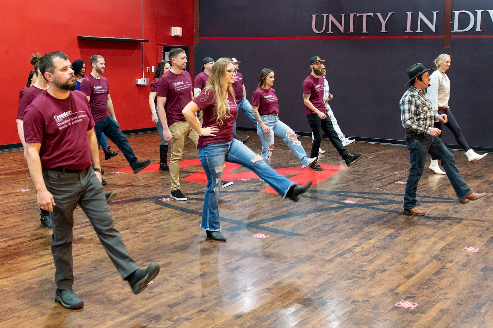 Company having a line dance lesson in Nashville